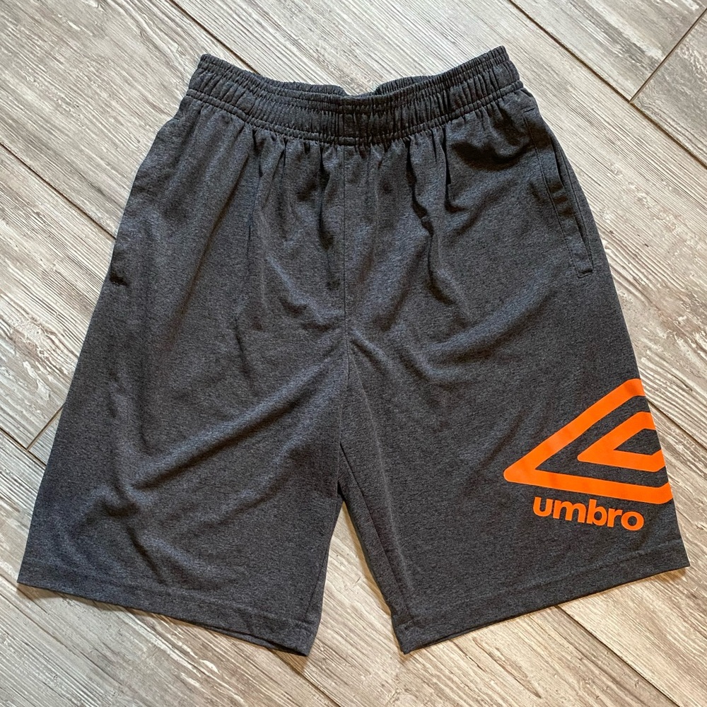 WORN ONCE UMBRO BOYS SHORTS.